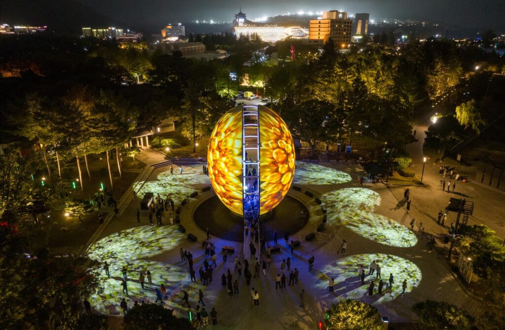 APEC Gyeongju events A giant APEC symbol illumination during the “Festival of Light” near Bomun Lake in Gyeongju, North Gyeongsang Province (Image credit - Yonhap)